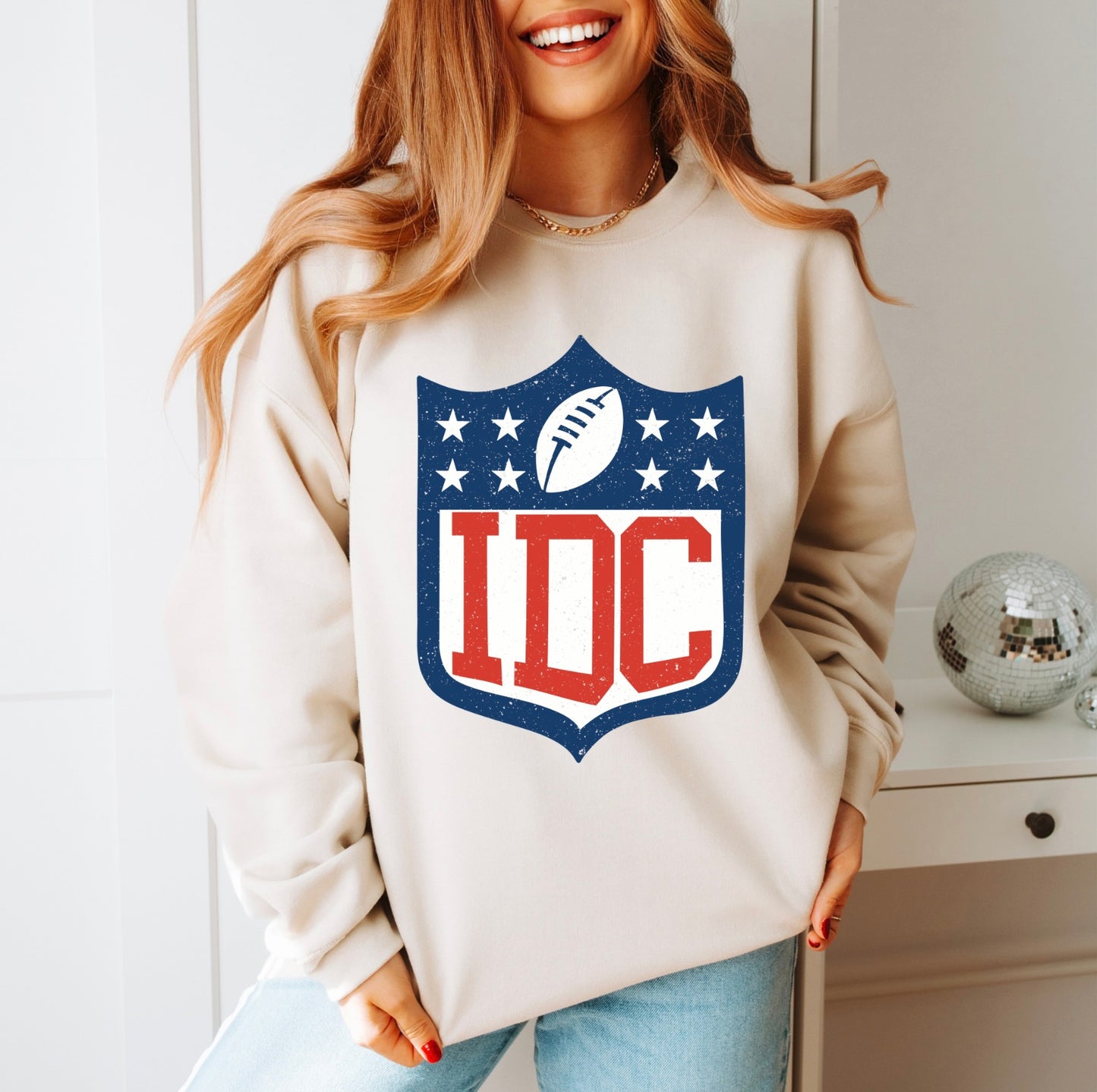 IDC football women’s tee