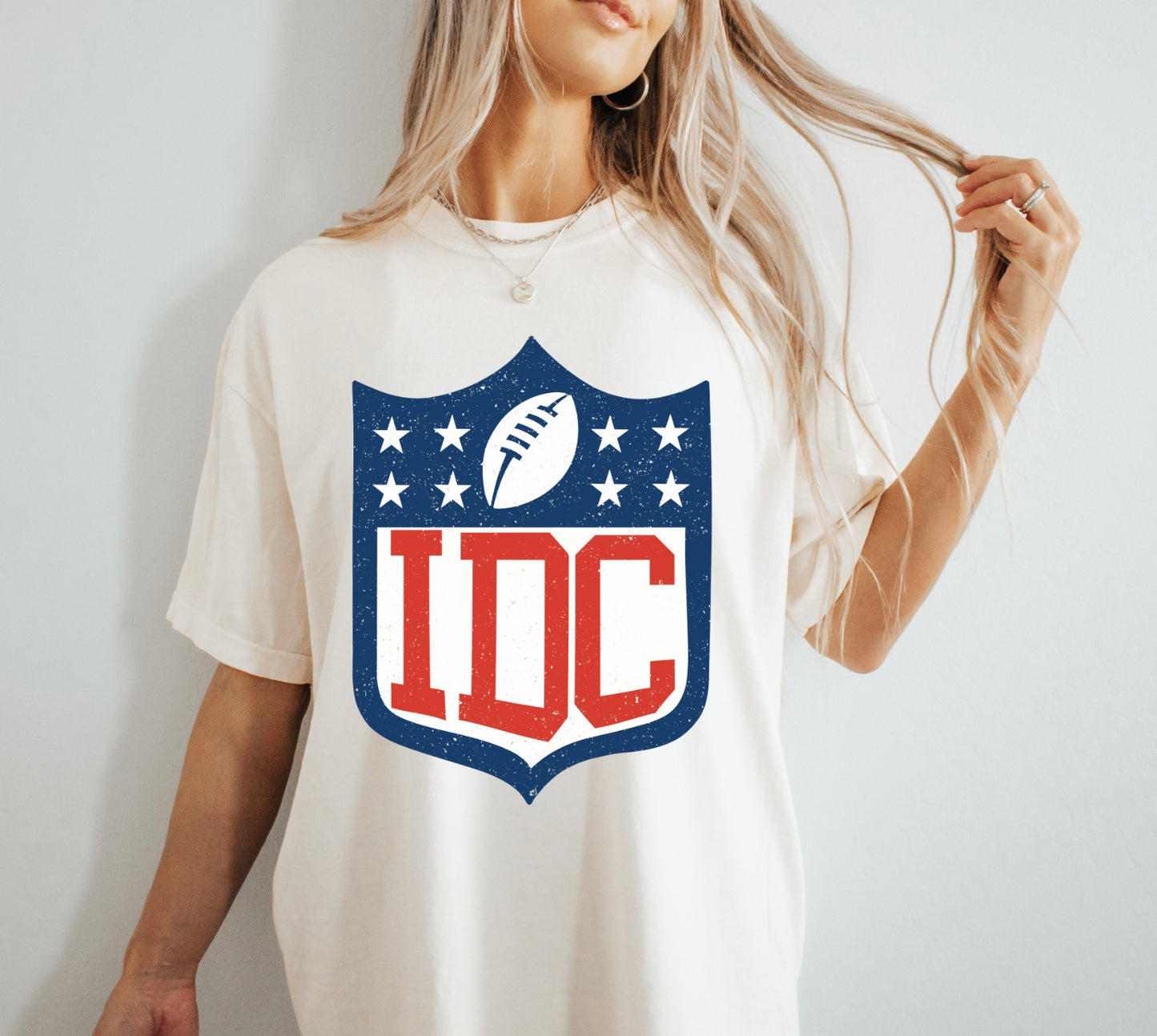 IDC football women’s tee