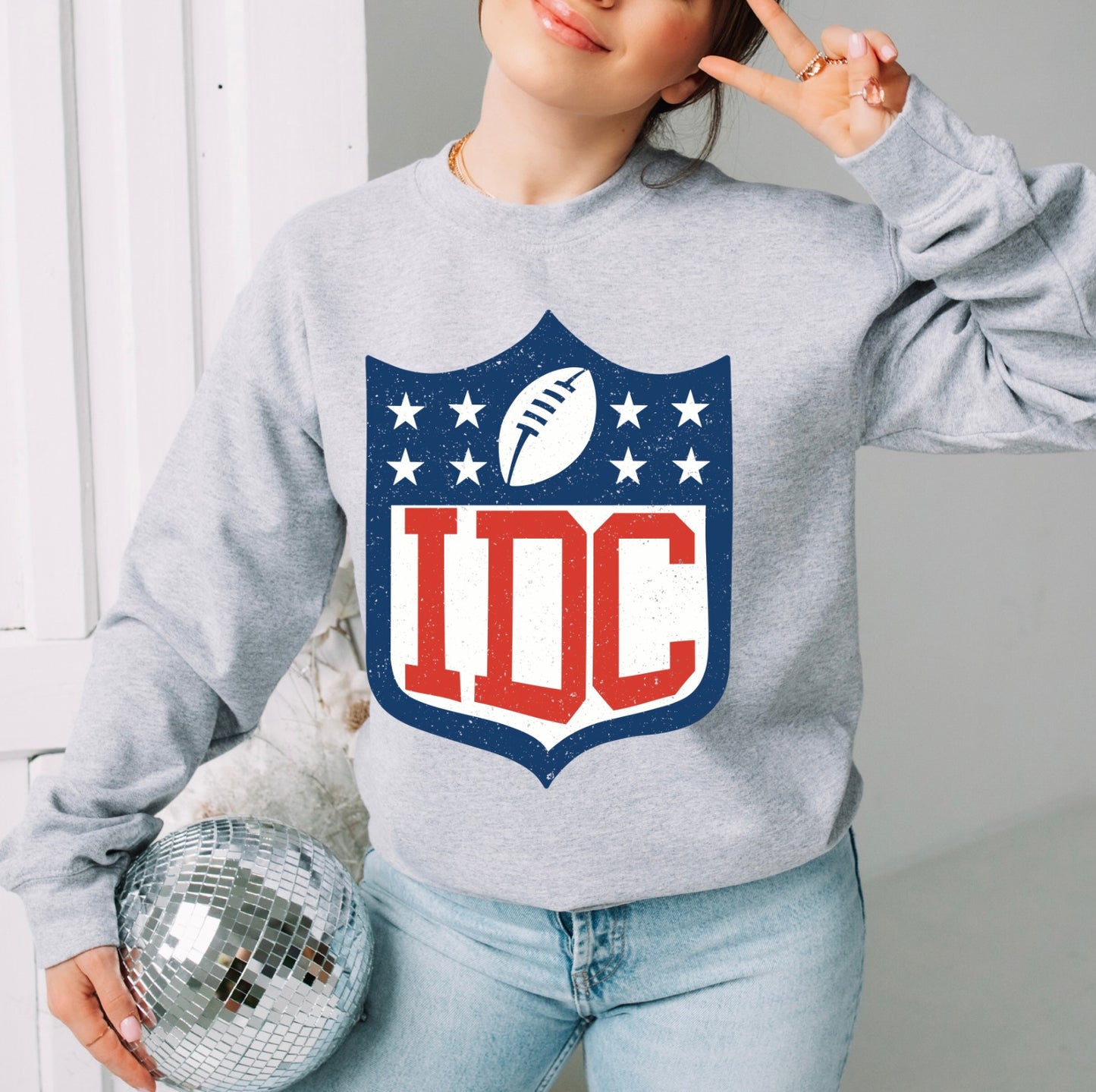 IDC football women’s tee